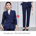 Navy blue two piece set with belted blazer and tailored pants complementing burgundy long sleeve small suit styles