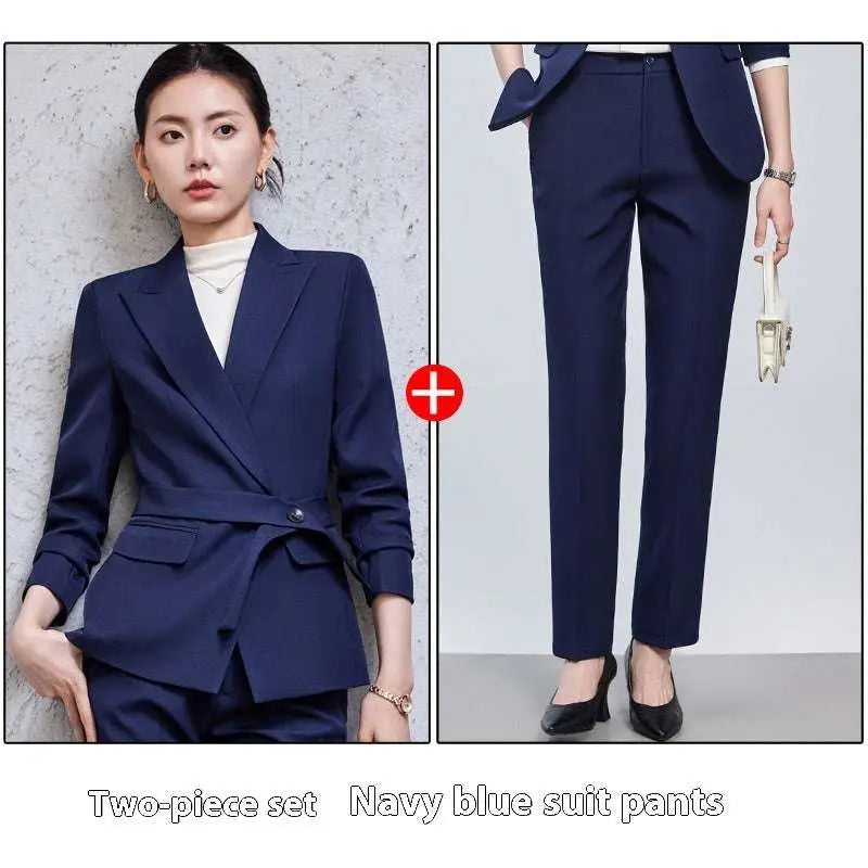 Navy blue two piece set with belted blazer and tailored pants complementing burgundy long sleeve small suit styles