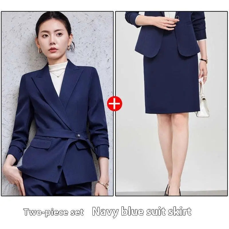 Navy blue tailored suit skirt with subtle peplum hem in burgundy long sleeve small suit two piece set collection