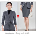 Gray two piece set featuring tailored blazer with belt and three quarter sleeves paired with matching pencil skirt