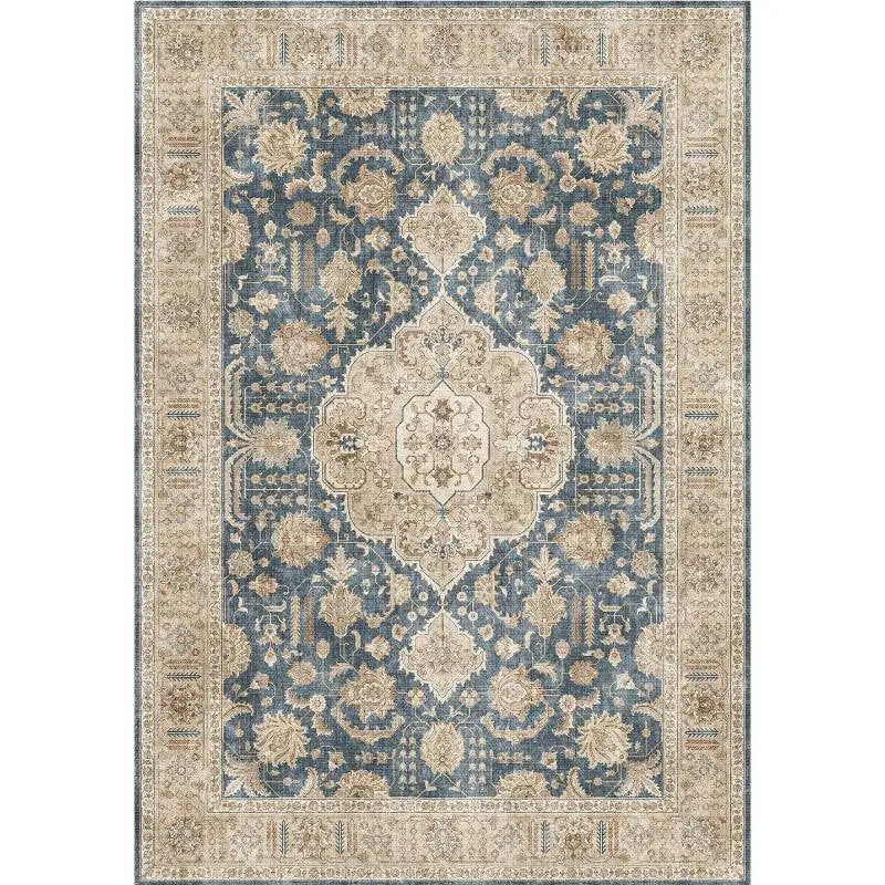 Burgundy ornate short pile area rug with intricate floral and geometric patterns and a central medallion design
