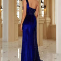 Burgundy velvet evening dress with one-shoulder design and high slit embellished with sequins on back and side