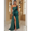 Emerald green one-shoulder evening gown with sequined bodice, satin skirt, and high slit inspired by burgundy velvet design