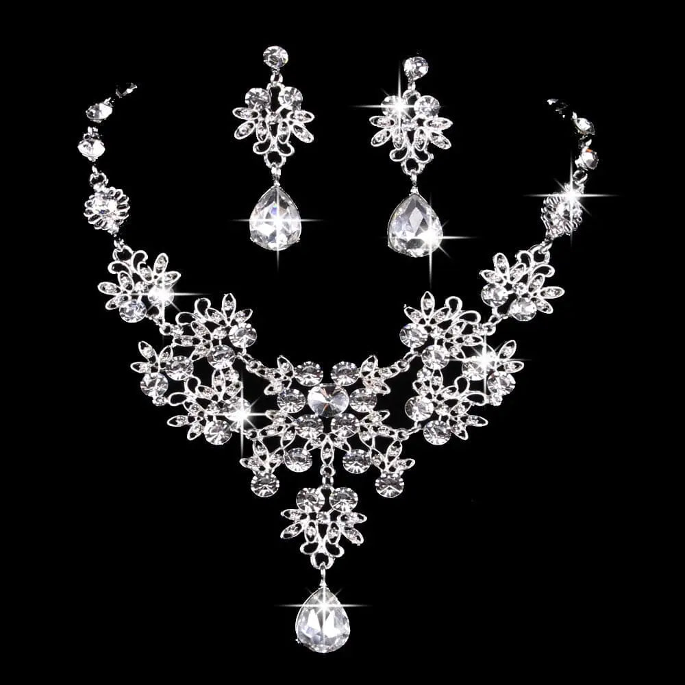 Silver-toned floral butterfly necklace earring set with sparkling blue crystal and water drop necklace design