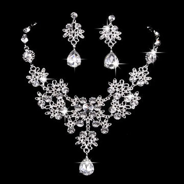 Silver-toned floral butterfly necklace earring set with sparkling blue crystal and water drop necklace design