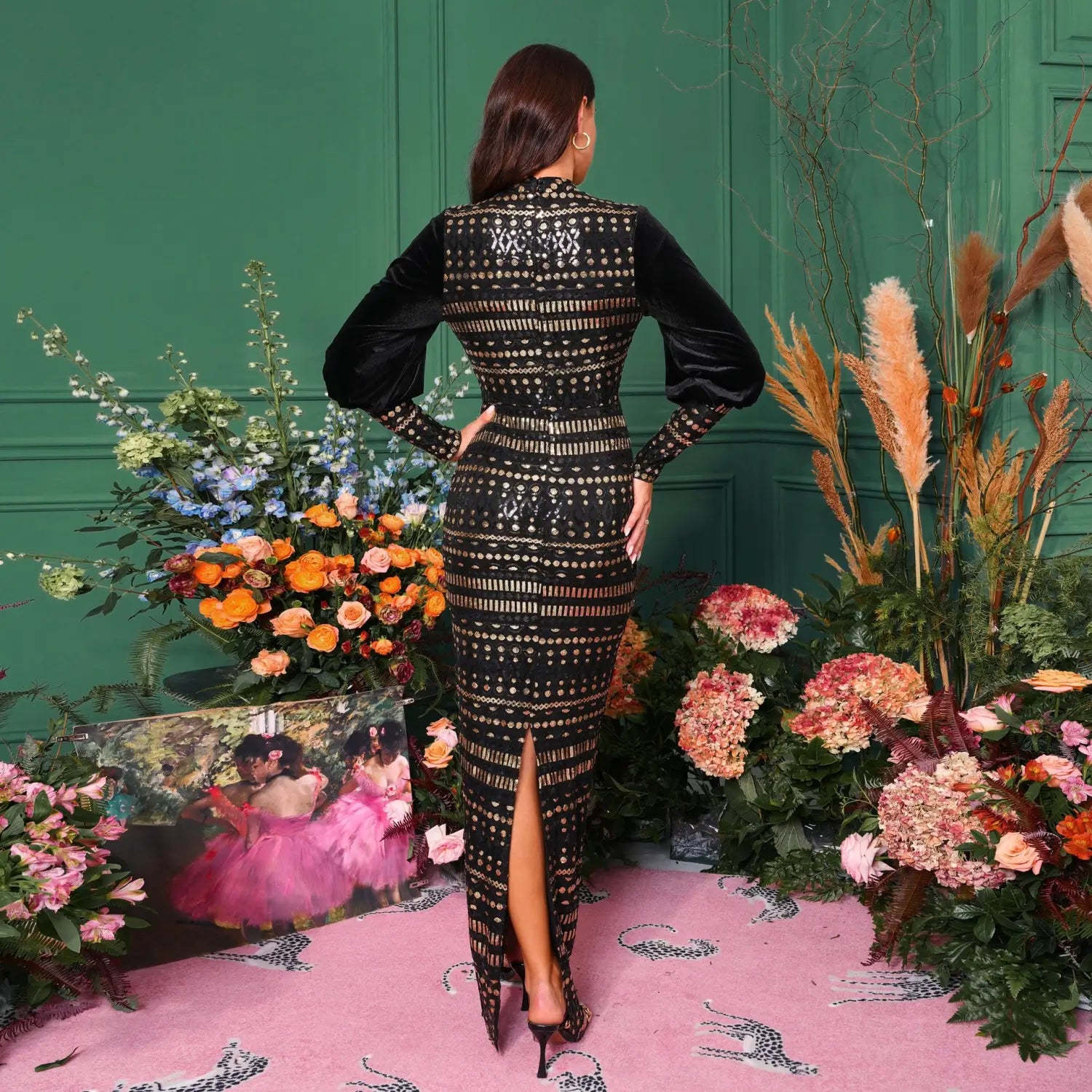 black velvet long sleeve round neck sequined maxi dress with gold sequin detailing and a high slit