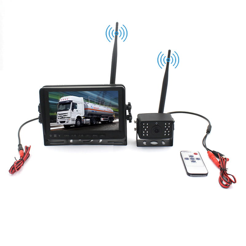 Black seven-inch wireless rear view camera system with analog signal, including a 7-inch monitor and remote control for vehicle use