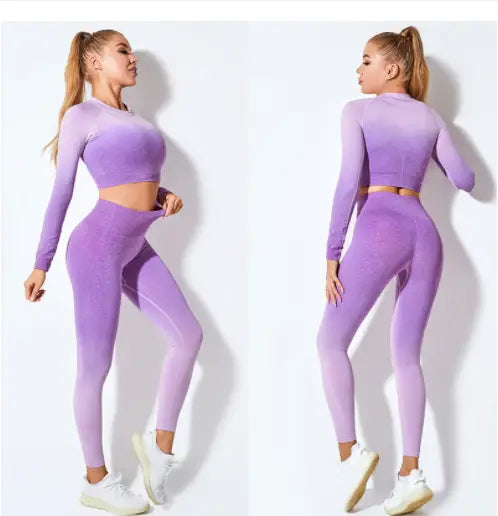 women’s seamless gradient long sleeve yoga set featuring a purple gradient long sleeve crop top and matching seamless gradient leggings made for comfortable athletic wear