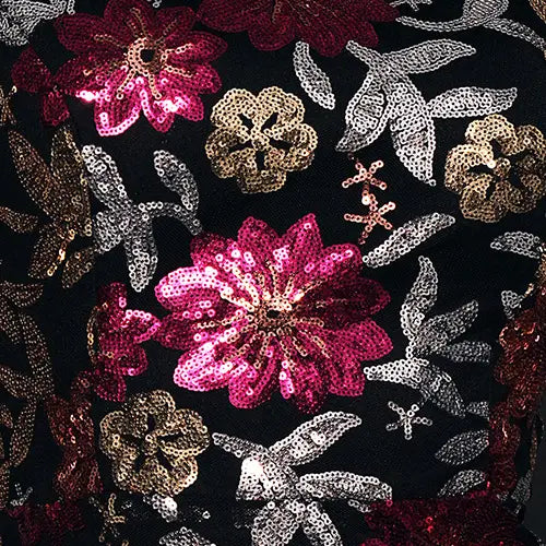 black fabric embroidered floral long sleeve evening gown adorned with vibrant pink gold and silver sequined floral embroidery