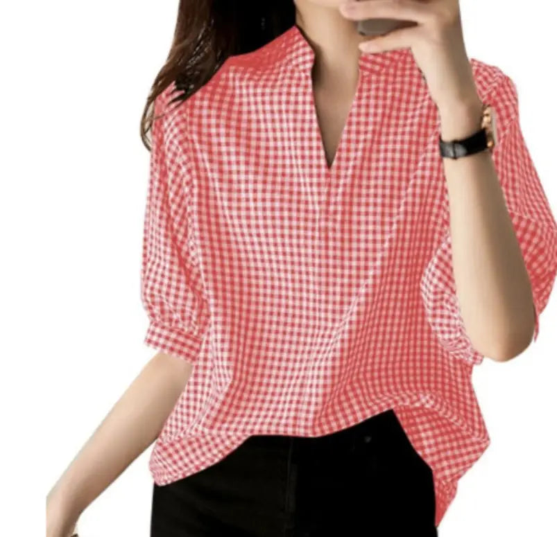 Red and white gingham check loose casual half sleeve blouse with a v-neckline and three-quarter length sleeves.