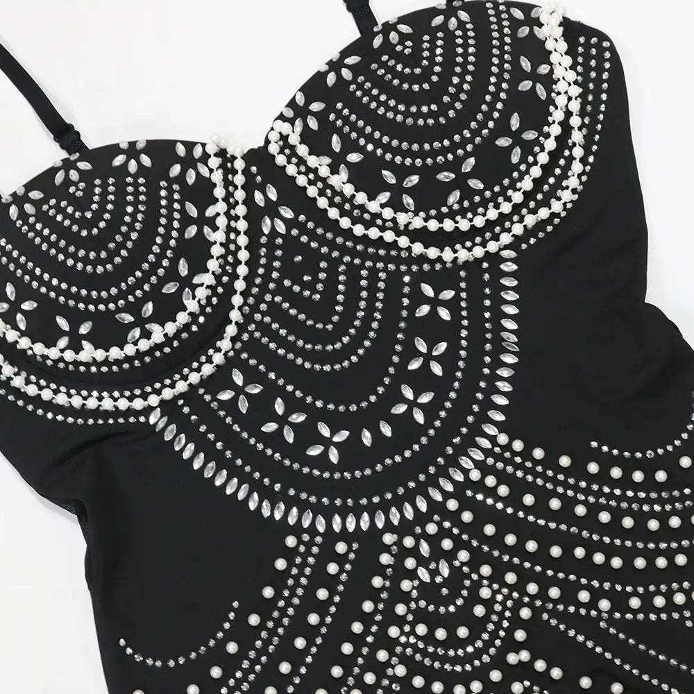 Black bodysuit evening dress featuring intricate sling hot drilling silver rhinestone and pearl embellishments arranged in swirling fan-like geometric patterns.