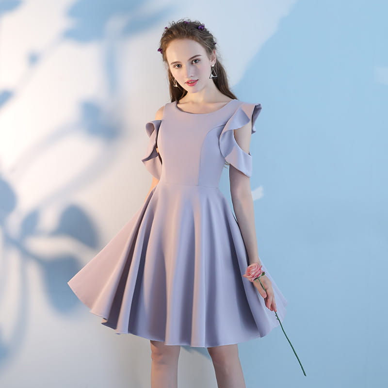 A soft lavender off the shoulder dress with ruffled sleeves and a flared skirt made from main fabric composition by Pink Short Sisters.