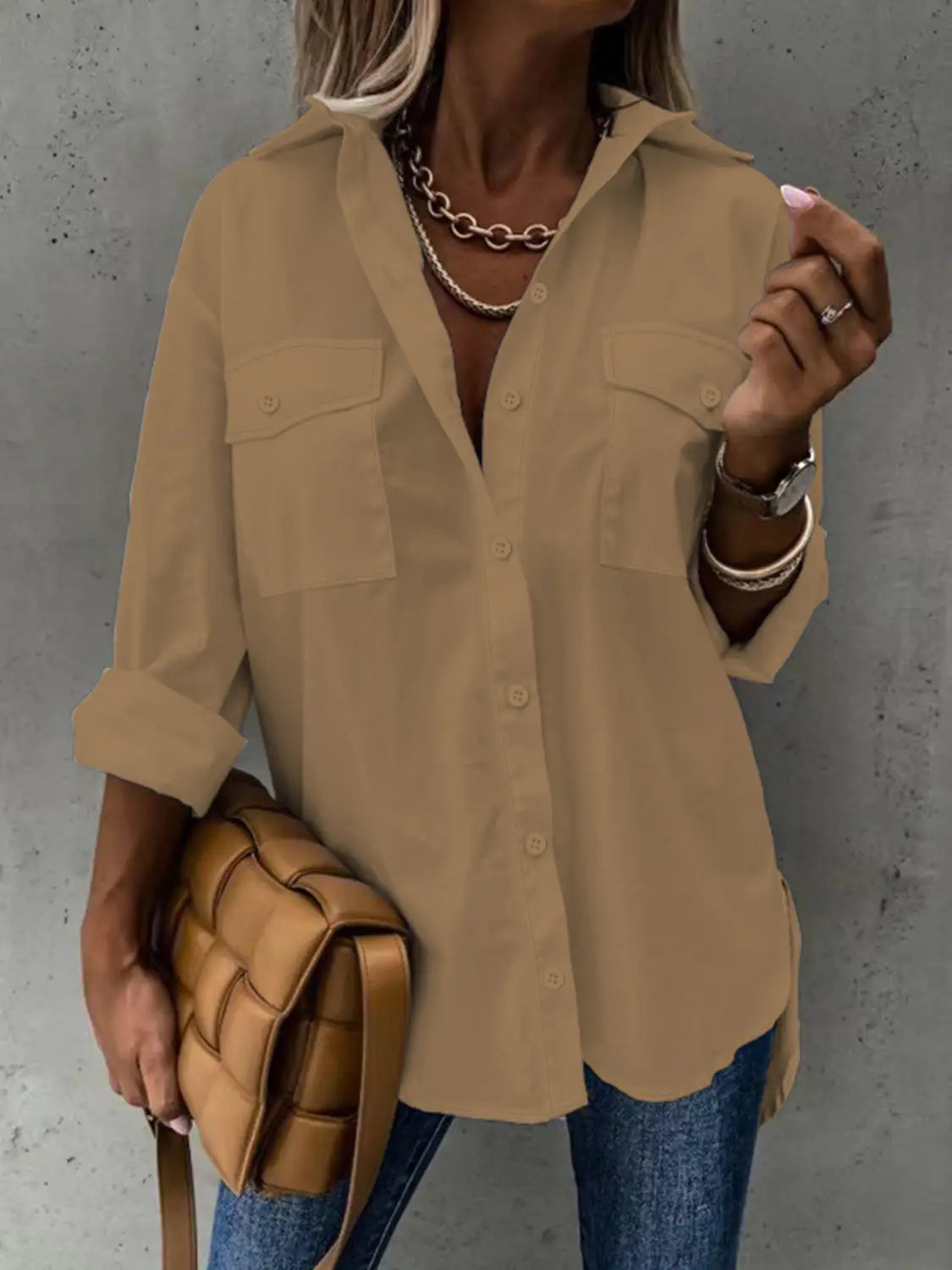 beige loose long sleeve button up shirt with two chest pockets and rolled sleeves featuring a lapel collar design