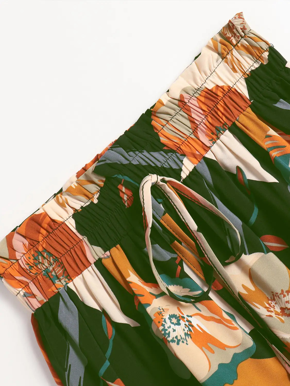 green and orange floral print shorts with a drawstring waistband featuring pleated floral print elastic waist for comfortable wear
