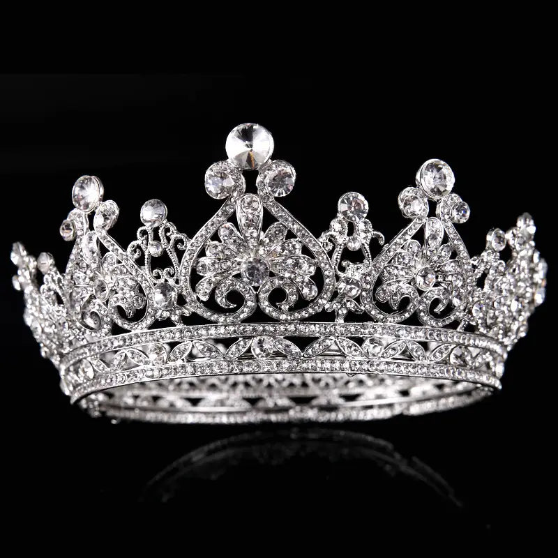 A sparkling silver rhinestone big European princess crown hair featuring intricate floral and scrollwork designs embellished with clear rhinestones for an elegant American princess crown look.