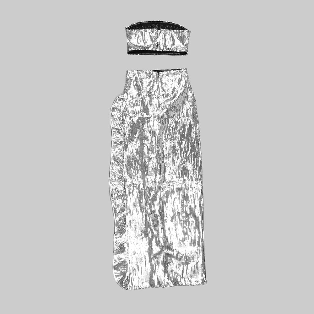 a shiny silver sequined strapless top paired with a matching high-waisted sequin skirt set perfect for elegant occasions