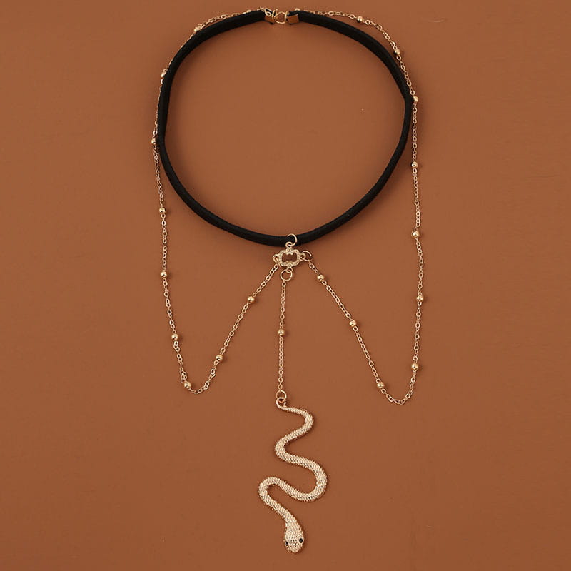 black velvet choker necklace with bohemian boho gold big snake pendant and beaded chain details