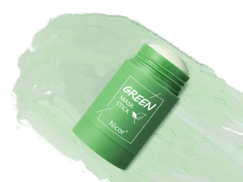 green cylindrical cleansing green tea and eggplant oil control mask stick by nicor with white label and leaf logo