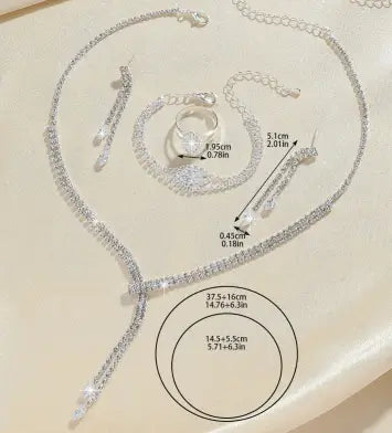 Silver-toned diamond-studded fashion simple necklace with a delicate chain and sparkling pendant from a simple necklace earring bracelet set.
