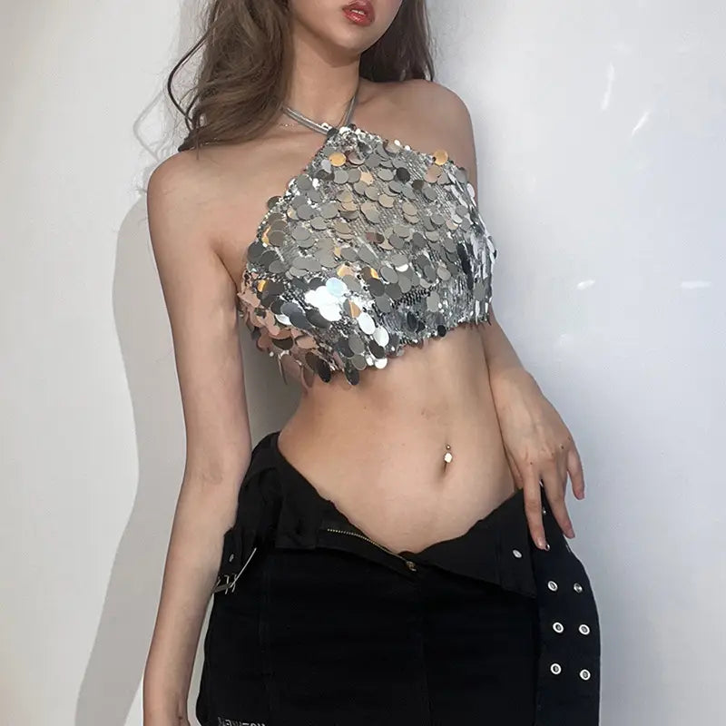 shiny silver halter backless sequined vest with a fitted cropped design made of sequined material