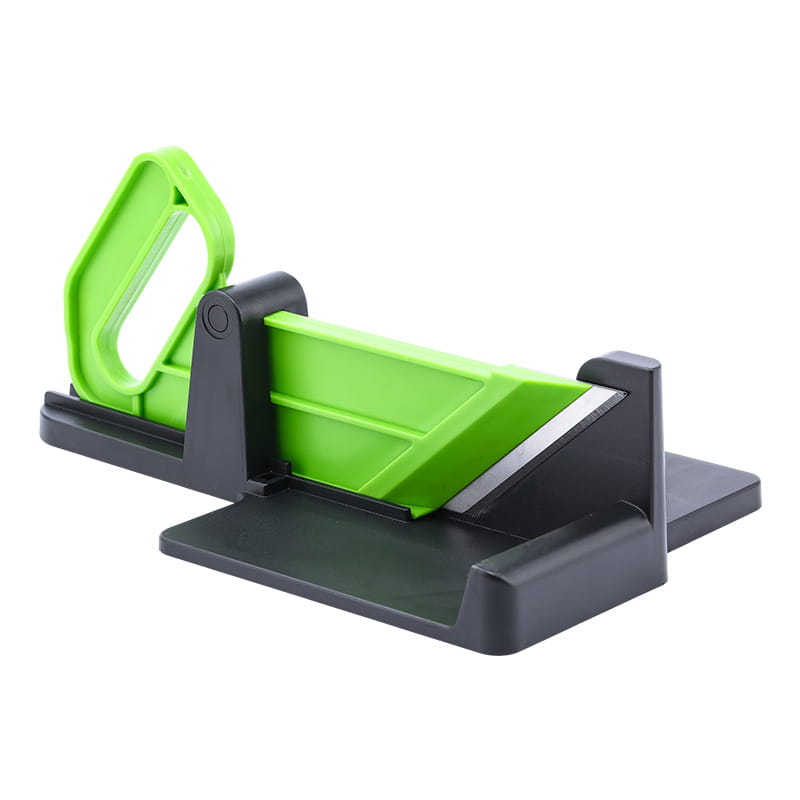 Green and black plastic multifunctional vegetable cutting meat slicer with ergonomic handle designed for easy grip in vegetable cutting kitchen use