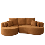 Caramel fabric cloud curved sectional sofa with warm plush fabric and matching throw pillows for cozy seating