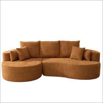 Caramel fabric cloud curved sectional sofa with warm plush fabric and matching throw pillows for cozy seating