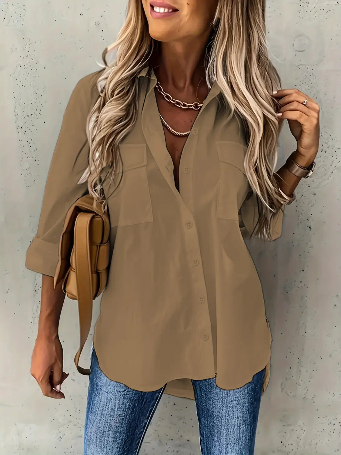 beige long sleeve button-up shirt with two chest pockets and rolled sleeves featuring a loose long sleeve lapel design