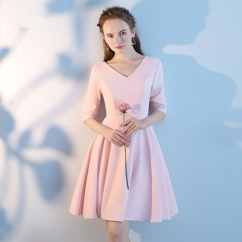 A soft pink short sisters off shoulder ruffled dress made of main fabric with a v-neck midi design featuring three-quarter sleeves and a flared skirt.