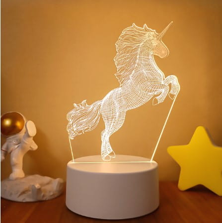 A white unicorn 3d led night light with a wireframe design glowing softly on a cylindrical base featuring colorful touch remote control lights.
