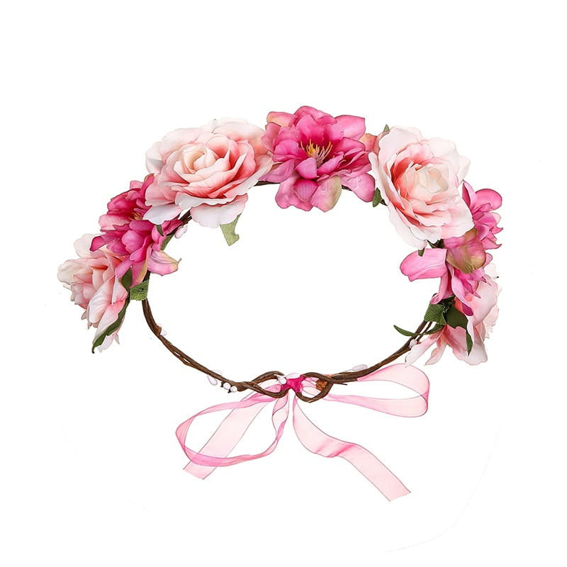 A delicate pink and white fabric colorful rose flower garland hair accessory made of artificial fabric colorful roses and green leaves with a matching sheer ribbon bow at the front.