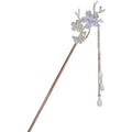 A delicate silver celestial moonstone xingx hairpin with sparkling floral design and dangling teardrop beads for updo moonstone style