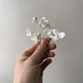 Delicate white ceramic flower pearl embellished bridal hairpin set with tiny pearls and intricate petal details