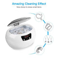 White oval-shaped ceramic ultrasonic cleaning machine with silver lid and digital control panel for precise cleaning