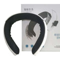White and black cervical spine integrated massage device with soft padded interior for comfortable neck therapy