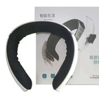 White and black cervical spine integrated massage device with soft padded interior for comfortable neck therapy