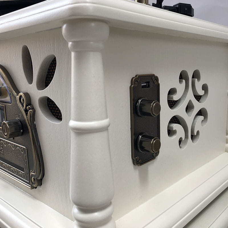 Vintage white gramophone speaker with ornate black metal accents and decorative cutouts designed for classical living room or room tea stereo use.