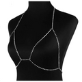 Silver rhinestone body chain harness paired with a champagne satin blouse featuring rhinestone body jewelry accents