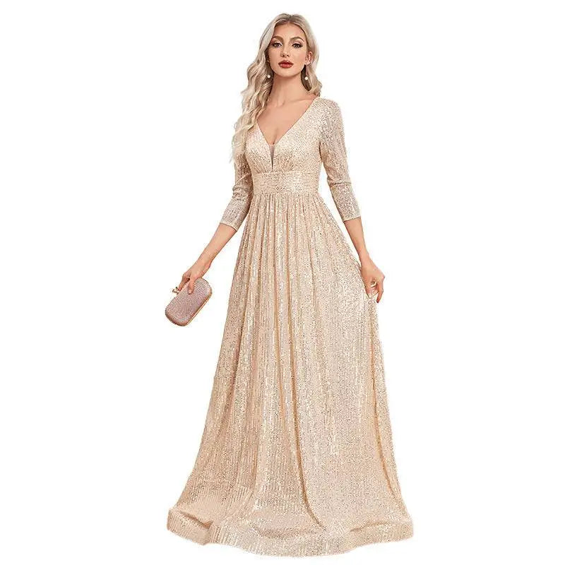 Champagne sequined evening gown with deep v-neckline and three-quarter sleeves for formal party events