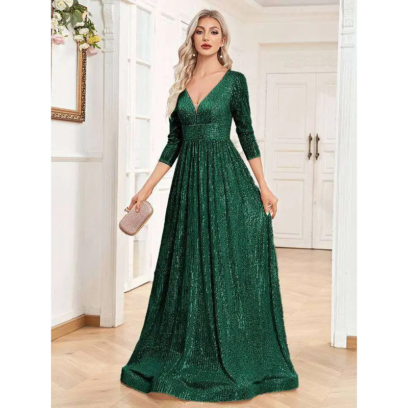 Emerald green sequined evening gown with deep v-neckline and three-quarter sleeves for formal occasions