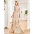 Champagne sequined evening gown with deep v-neckline, three-quarter sleeves, fitted bodice, and flowing skirt for formal events