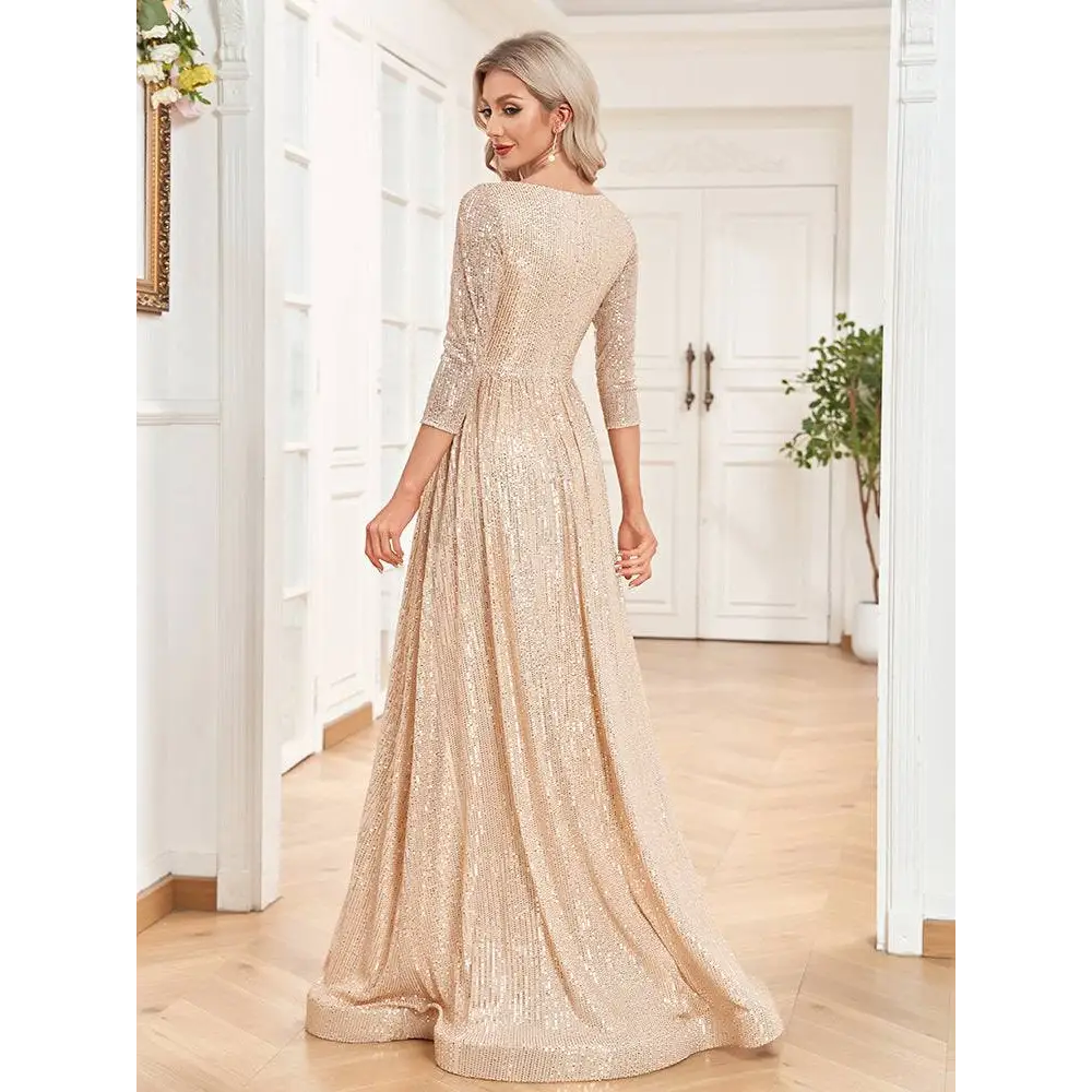 Champagne sequined evening gown with deep v-neckline, three-quarter sleeves, fitted bodice, and flowing skirt for formal events