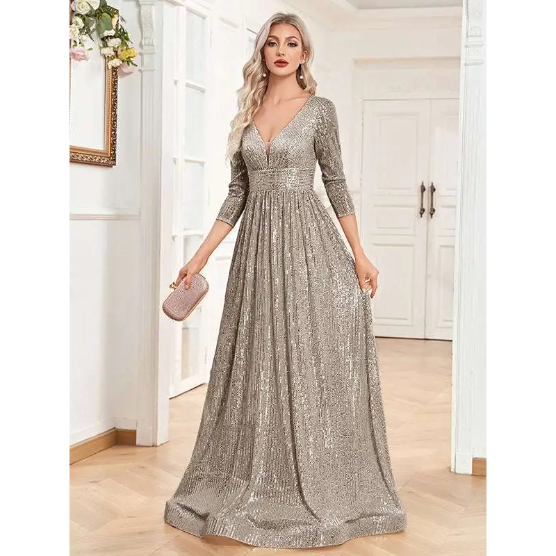 Champagne sequined evening gown with deep v-neckline and three-quarter sleeves for formal party wear