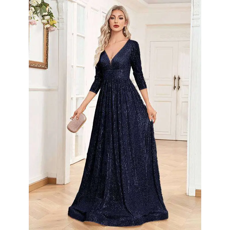 Navy blue sequined evening gown with deep v-neckline, three-quarter sleeves, and high waist for formal parties