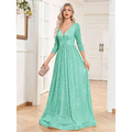 A shimmering mint green sequined evening gown with a deep v-neckline and three-quarter sleeves for formal events