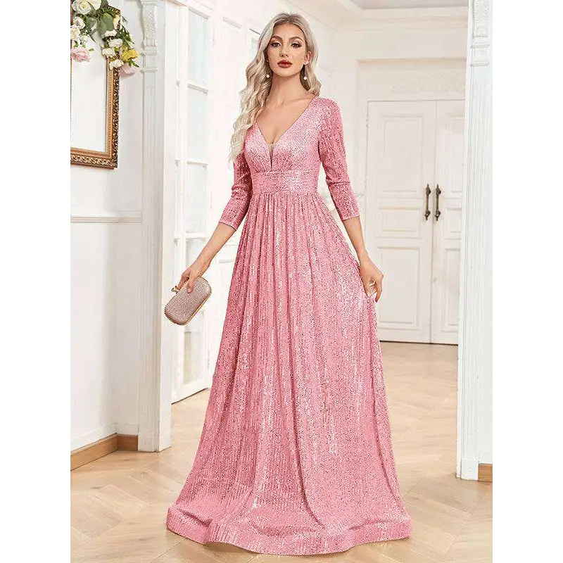 A shimmering pink sequined evening gown with deep v-neckline and three-quarter sleeves for formal events