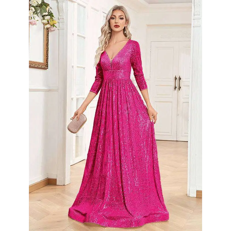 A vibrant fuchsia sequined evening gown with a deep v-neckline and three-quarter sleeves for formal occasions