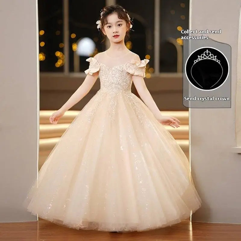 A shimmering off-white champagne sequined spandex princess dress with delicate beading and girls tulle tutu details