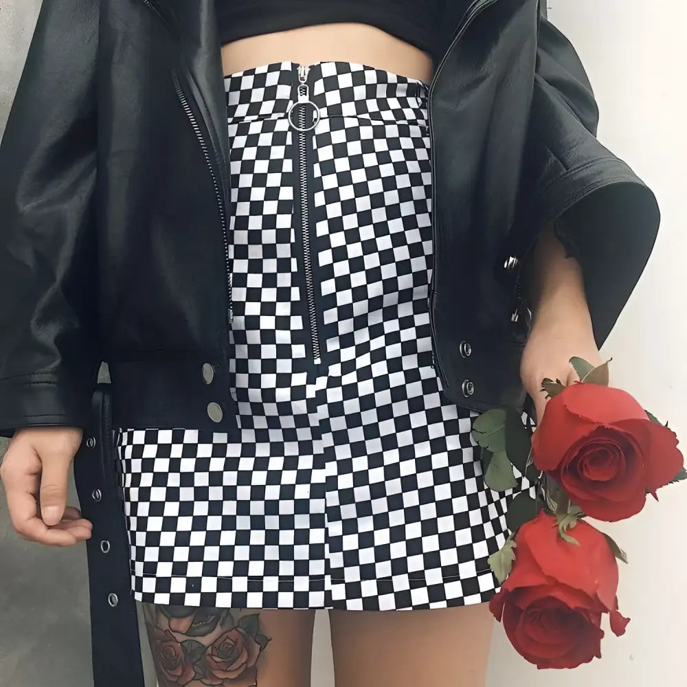 Black and white checkered mini skirt with front zipper closure featuring variable mso-font-signature design