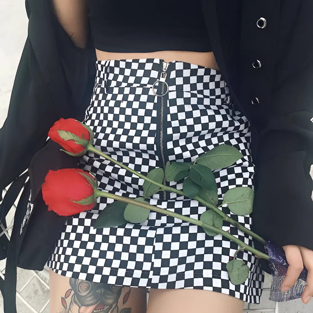 Checkered mini skirt with white checkered pattern and front zipper closure in variable mso-font-signature design